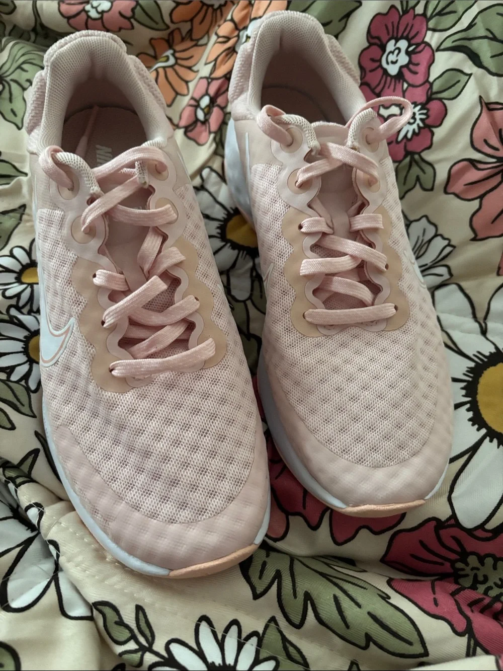 Nike Women’s Light Pink Mesh Running Sneakers with White Swoosh